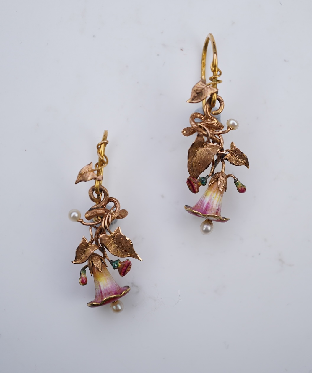 A rare pair of naturalistic gold, enamel and seed pearl earrings, circa 1850
